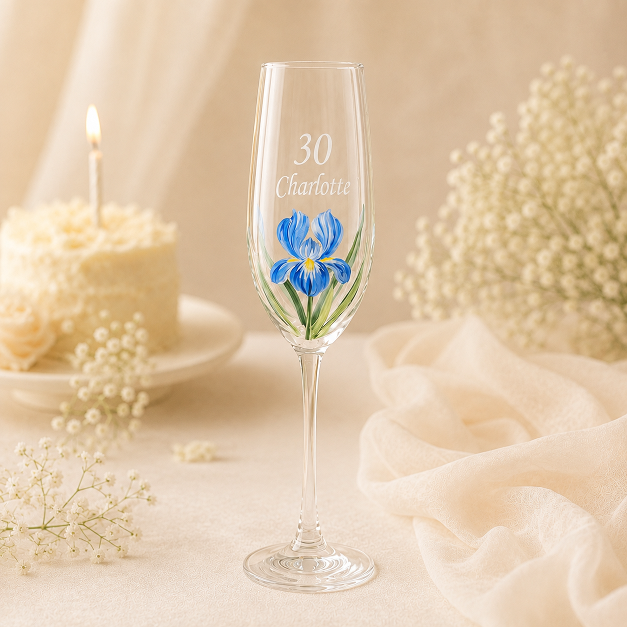 Personalized blue iris champagne flute with white Charlotte name and 30 birthday lettering