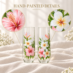 Close-up hand-painted hibiscus and plumeria details on personalized tropical floral glassware