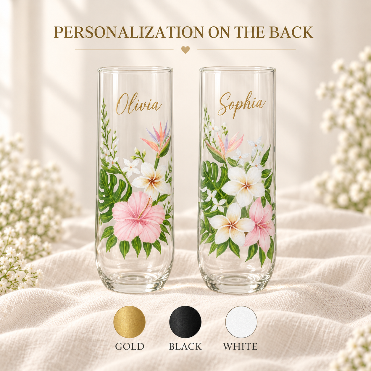 Personalized tropical floral glasses with custom gold names and hand-painted hibiscus and plumeria flowers